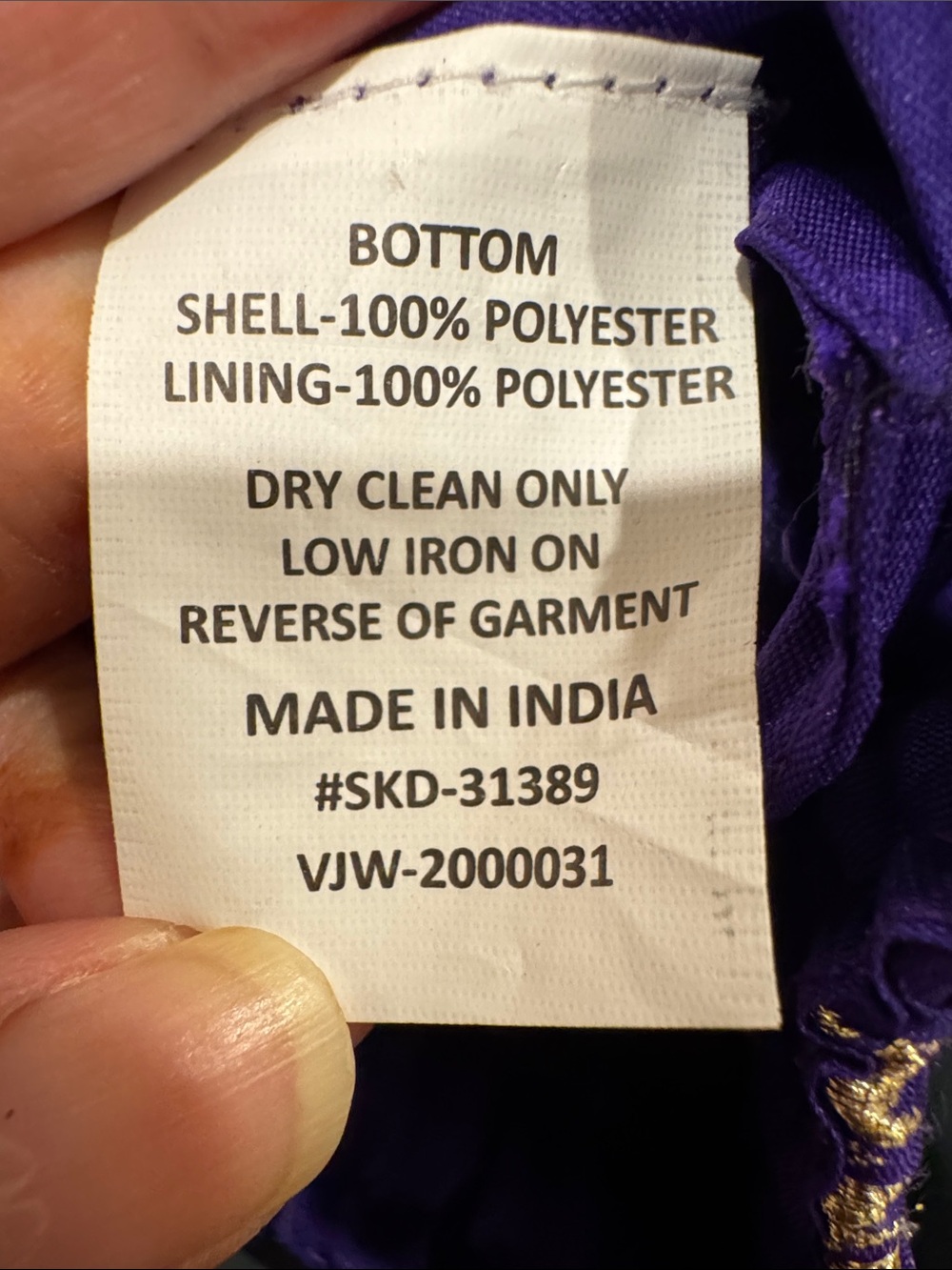 Purple Garment with Red Size Tag '32'